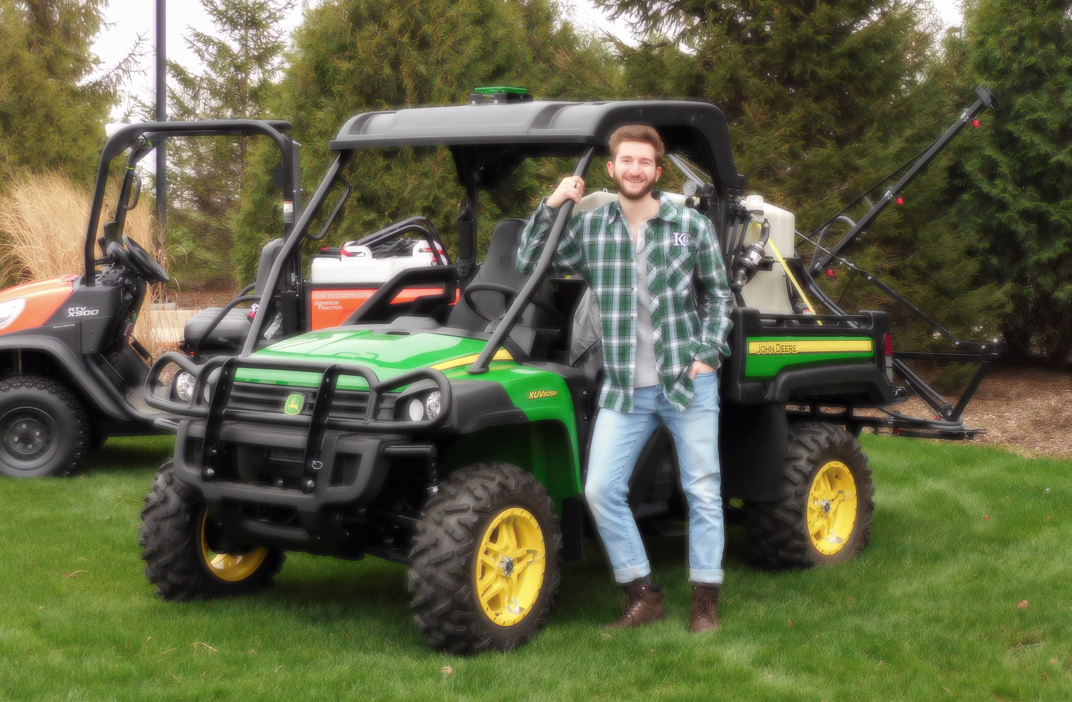 Kishwaukee College student Dakota Montavon tries out the new John Deere UTV Crossover Gator purchased for the Kish Agriculture Program.